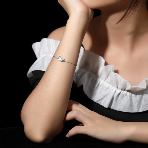 Papillon - Moissaniittirannekoru, jossa on perhosaiheinen charm ja säädettävä ketju